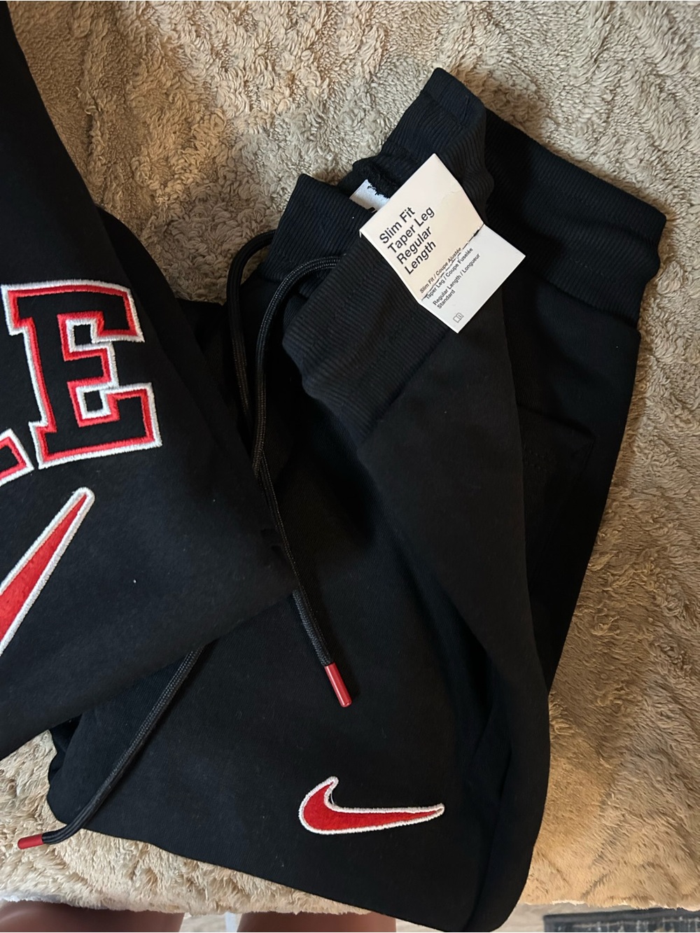 Nike Men’s Black Joggers with Red Swoosh